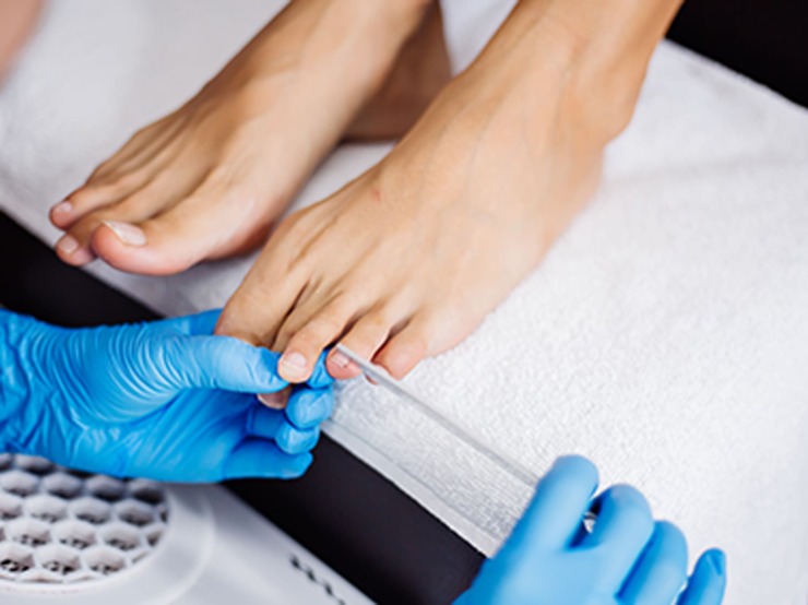 pedicure-process-home-salon-pedicure-foot-care-treatment-nail-process-professional-pedicures-master-blue-gloves-make-pedicure-1-6.jpg
