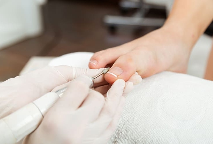 young-woman-doing-pedicure-salon-beauty-concept-1.jpg