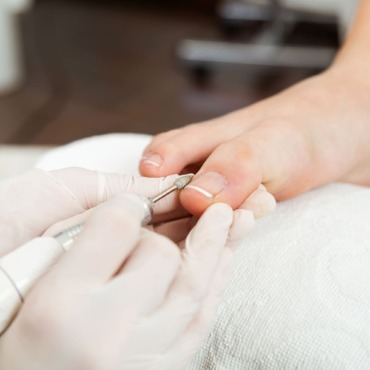 young-woman-doing-pedicure-salon-beauty-concept-Recovered.jpg